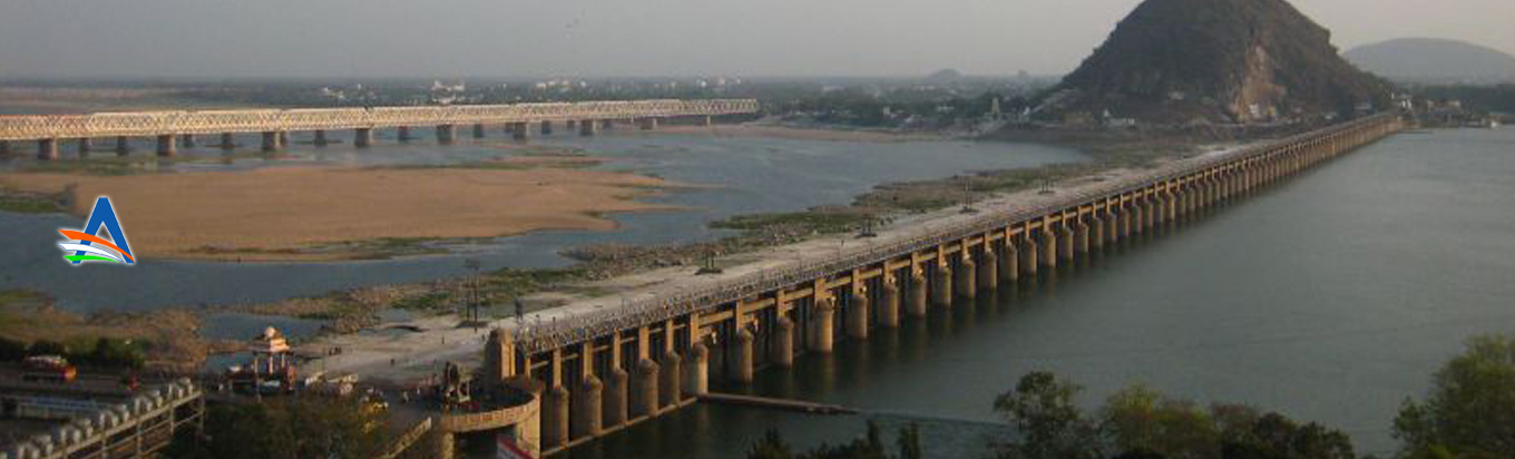 Witness the massive Prakasam Barrage stretching from Krishna to Guntur